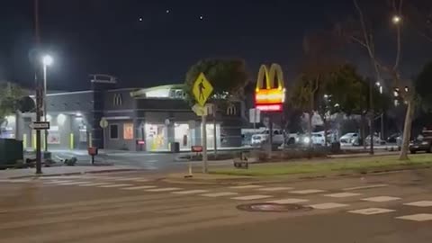 Mysterious Orbs or UFOs Floating over McDonalds in Albany California