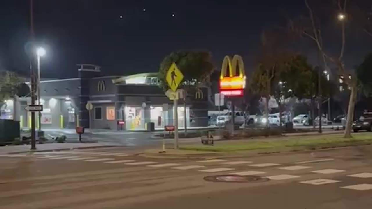 Mysterious Orbs or UFOs Floating over McDonalds in Albany California