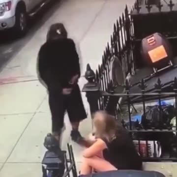 Darkie jizzing on a white woman in public