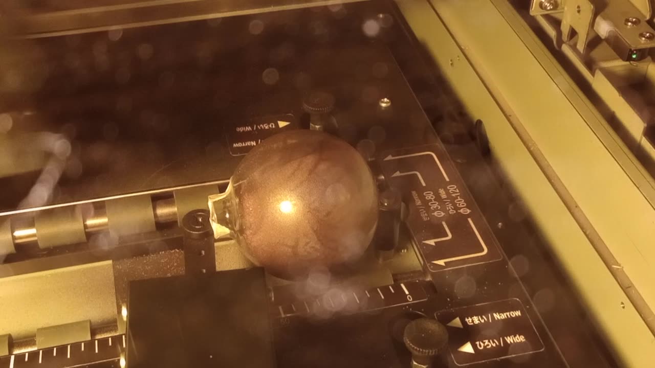 Mutoh 661 UV Printer printing on a Christmas bulb
