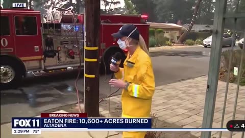 Fire Fighters Fill Their Trucks Using Residential Water as Fire Rages Out of Control