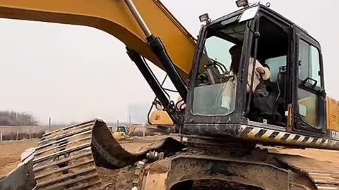 female excavator driver's skills installing wheel chains