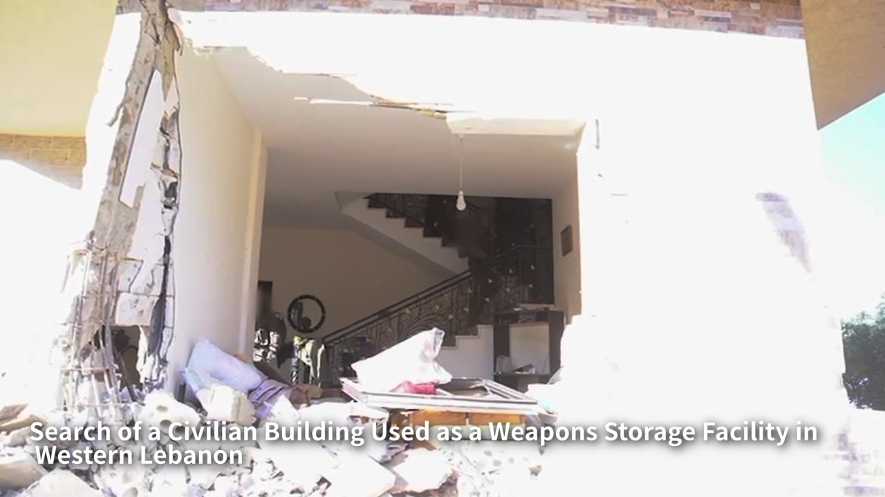 Footage of the search of a civilian building used as a weapons storage facility: