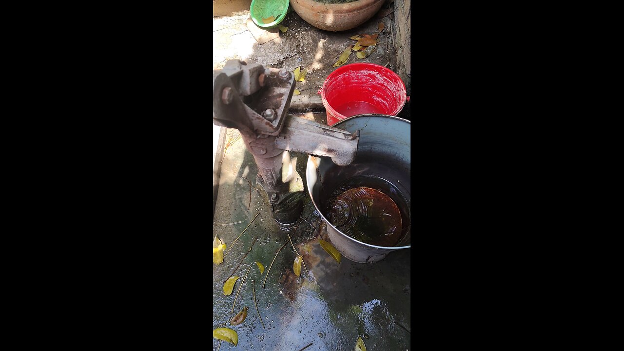 Taking a bath, pulling the tubule to get out the water