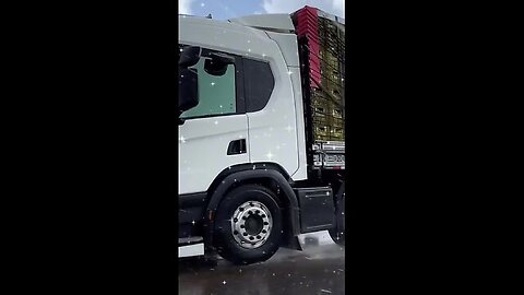 Fearless truck on wet rainy road