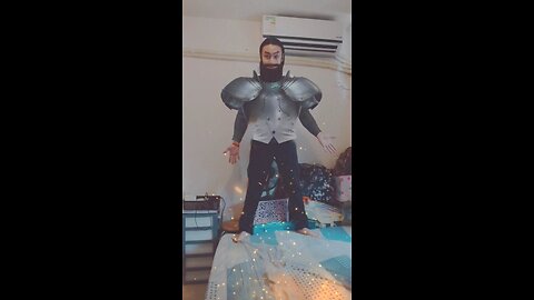 "The mighty Blackbeard Knight in armor: wearing shining silver-gray medieval metal shoulder armor