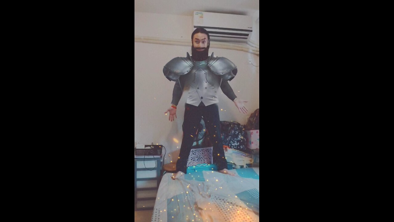 "The mighty Blackbeard Knight in armor: wearing shining silver-gray medieval metal shoulder armor