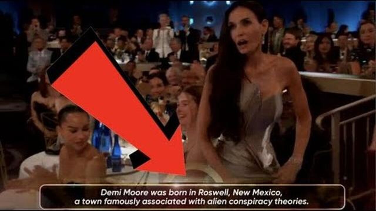 LOOK WHAT THEY PUT ON THE SCREEN AS DEMI MOORE WON AWARD FOR BEING "A WITCH ADDICTED TO RED SERUM!"