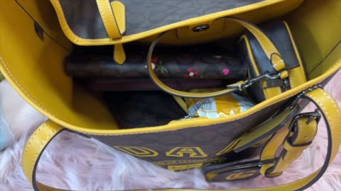 What's in my Coach Varsity City Tote in Buttercup