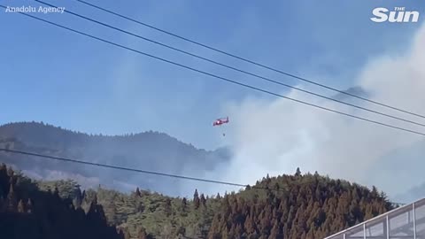 Blazing wildfires rip through Japan as thousands flee burning villages