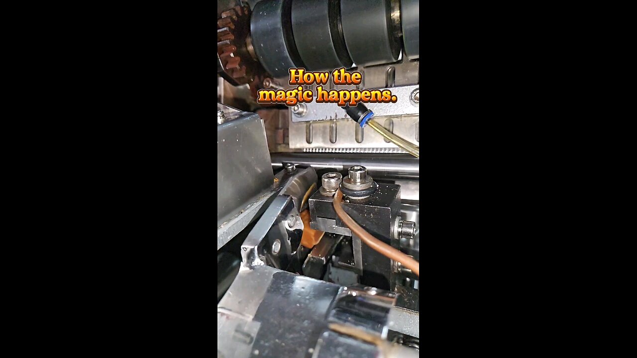 An ultra slow-motion look at how caramels are wrapped.