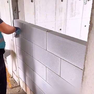 The satisfying process of building a brick wall!.hd