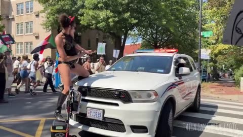 Tranny twerks on a cop car...... with police inside...