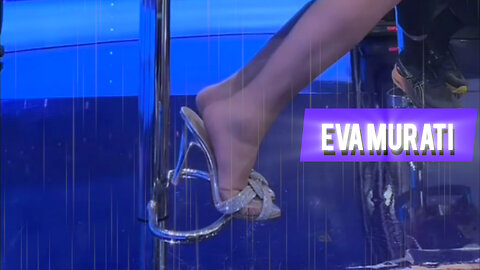 Eva Murati In A Black Mini Dress Shoeplaying In Her Heels