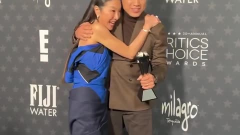 Michelle Yeoh _ Jon M. Chu embrace after his Best Director win. _CriticsChoice Awards _AwardsSeason