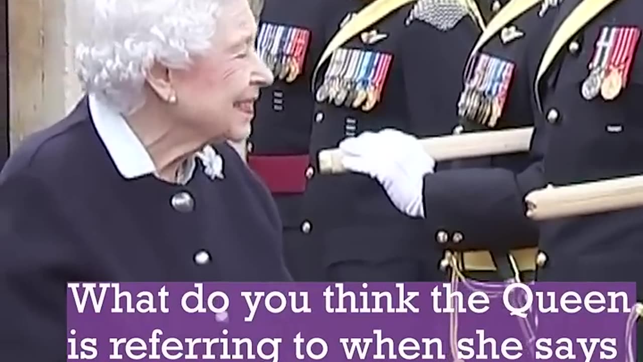 The Queen Giggles with Canadian Officers