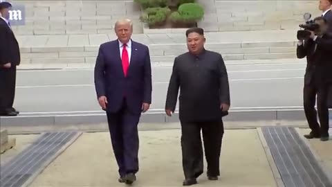 Moment Trump steps into North Korea to meet Kim Jong-un