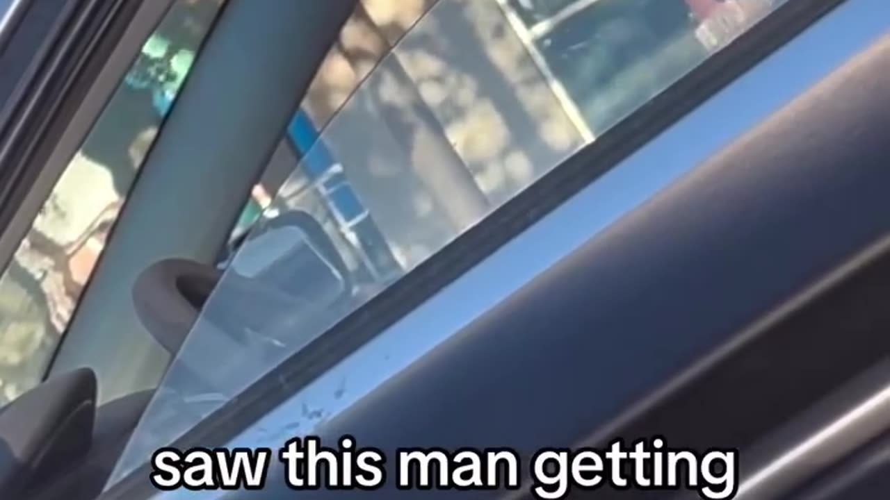 Man being serenaded by his wife in the car