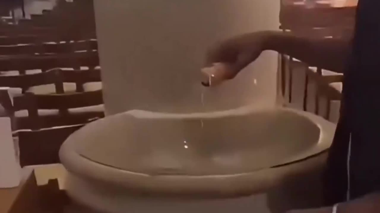 North Africans pour soda into holy water in a church in France and then run