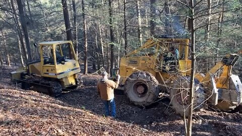 Getting stuck skidder off trail edge