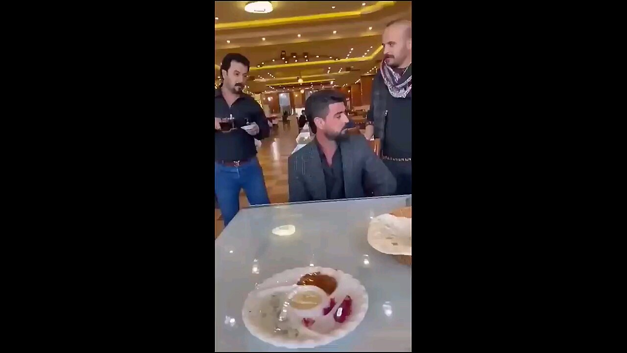 spilling coffee on strangersin the restaurant prank