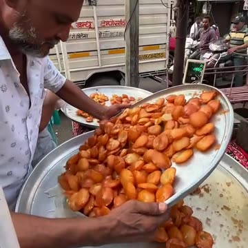 Kachori Indian Food on Street with Rats