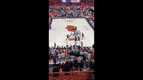 Oklahoma State beats Iowa State 74-68 and Cowboy fans storm the court.