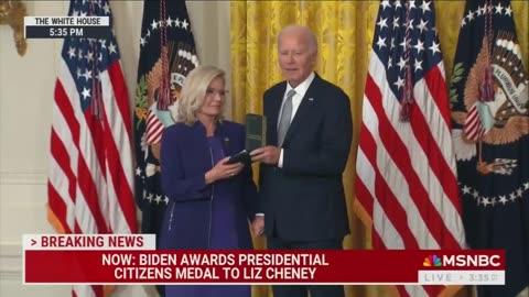 WATCH: Biden awards the Presidential Citizens Medal to Liz Cheney & refuses to let go of her hand 😬