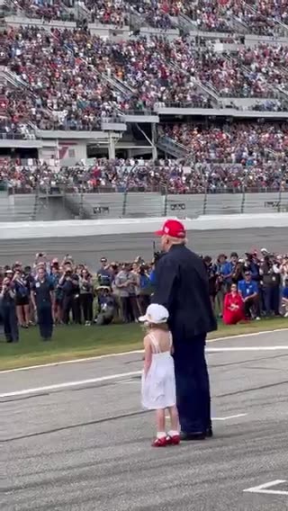 Tens of thousands of spectators roared with excitement, President Trump assisted his grandchild