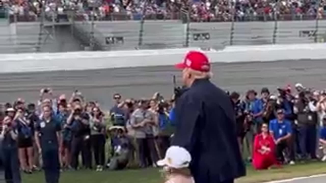 Tens of thousands of spectators roared with excitement, President Trump assisted his grandchild