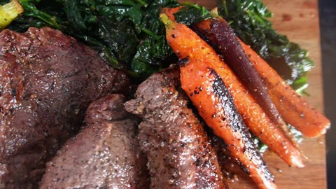 New York Strip Steaks with Baby Carrots and Spinach | Blackstone Griddles