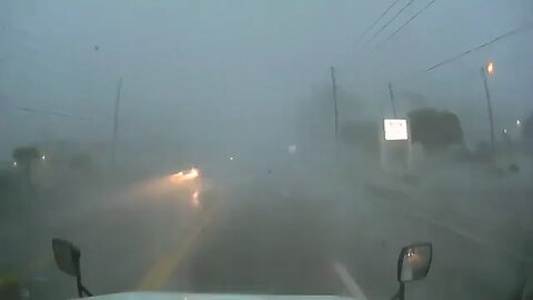 Tractor Trailer/Semi Truck Driving Through A hurricane. WOW