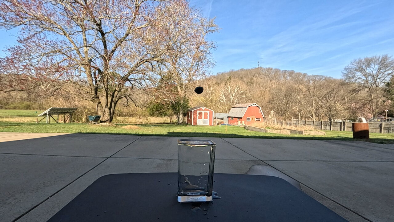 Slow Motion Hematite Stone Tiny Drop / Splash Experiment