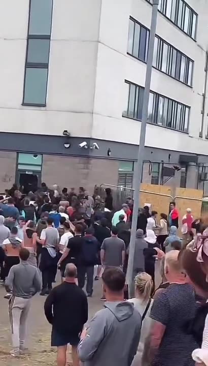 Protesters have stormed the Holiday Inn Express in Rotherham where illegal migrants are being housed