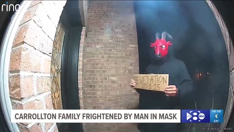 Unknown man wearing satanic mask.