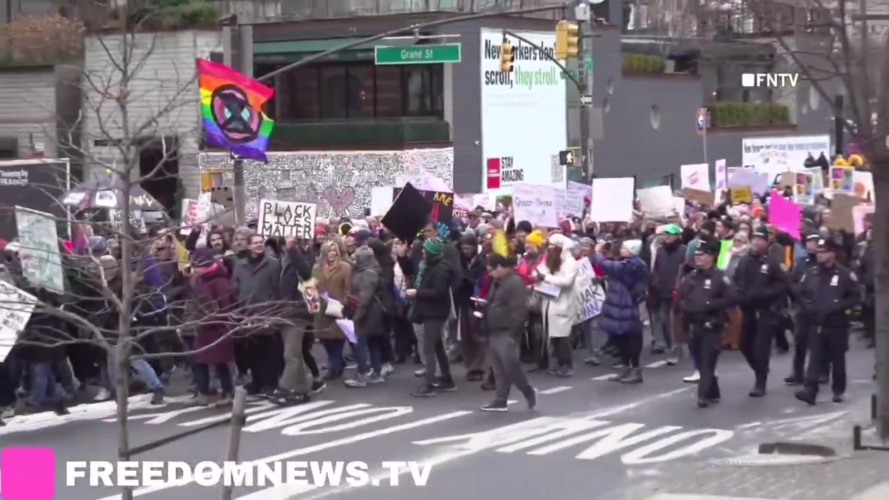 NOW: "F**k Trump" and "I'm scared" read signs as hundreds gathered in NYC