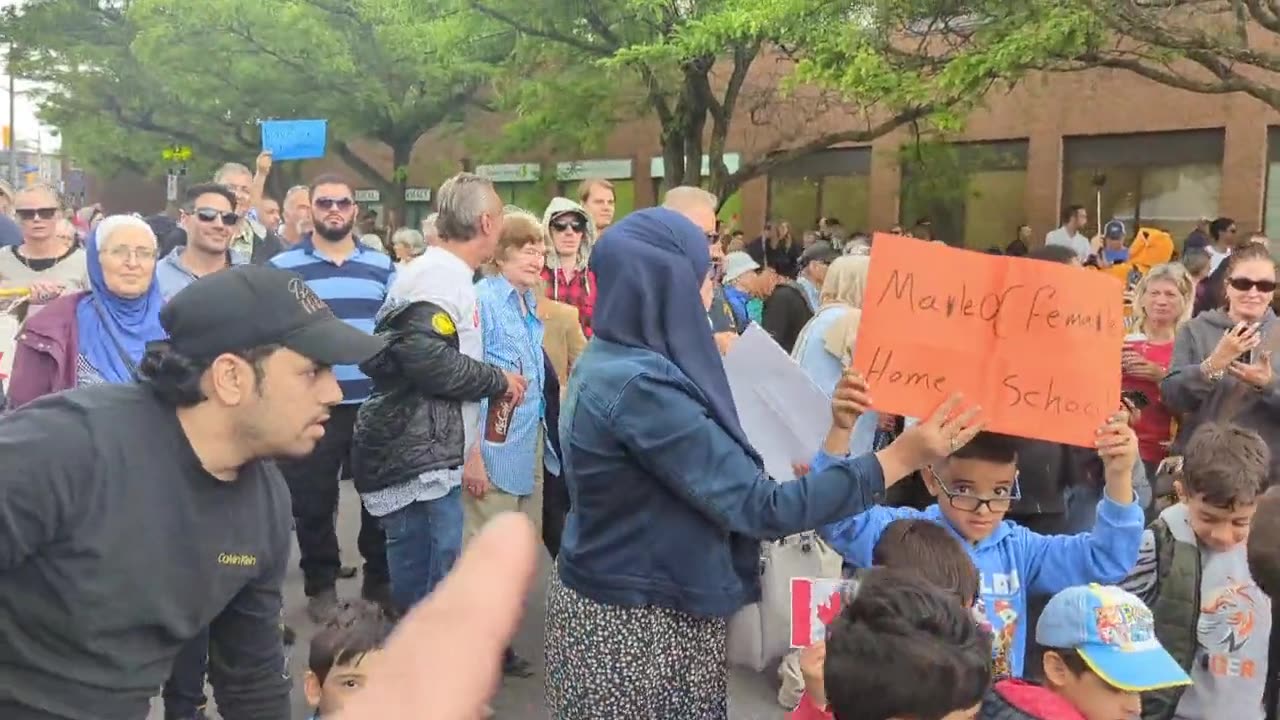 Muslim kids stomp on pride flags