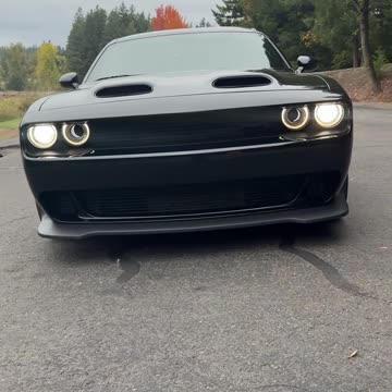 Evil idling #car #dodge #idling #menacing #evil #ominous #dark #black #strong #powerful #muscle