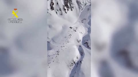 Spanish rescuers arrive by helicopter to scene of ski lift collapse