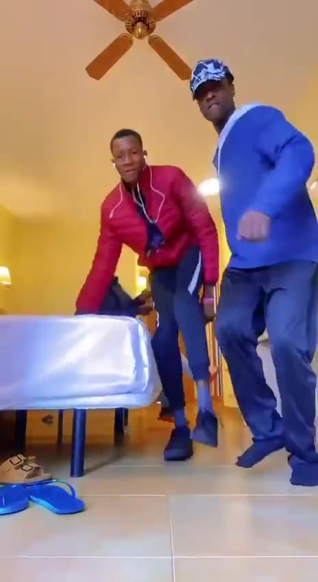 Arrogant illegal migrant invader men in designer outfits gloat in their 4-star hotel