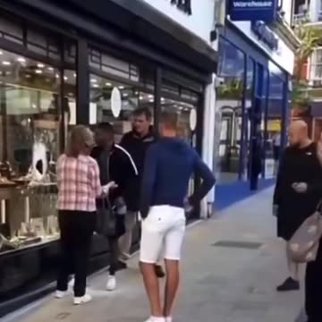 The New Normal in UK - Black man breaking jewelry store window and stealing items