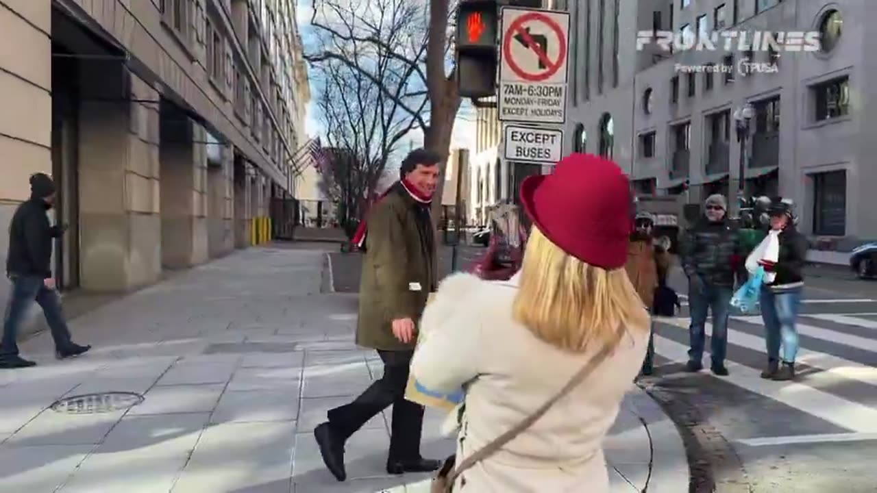 Lots of love for Tucker Carlson as he casually walks down the streets of DC with no security