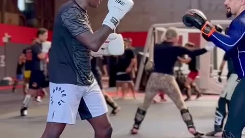 Israel Adesanya Teams Up with Former Rival Robert Whittaker in Training