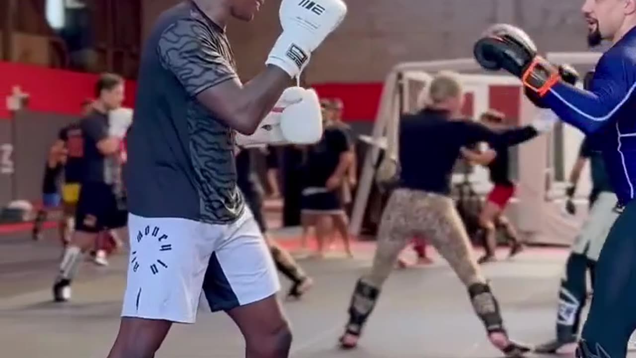 Israel Adesanya Teams Up with Former Rival Robert Whittaker in Training