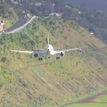 Crosswind landing of an A319 at Cristiano Ronaldo International Airport in Madeira, Portugal