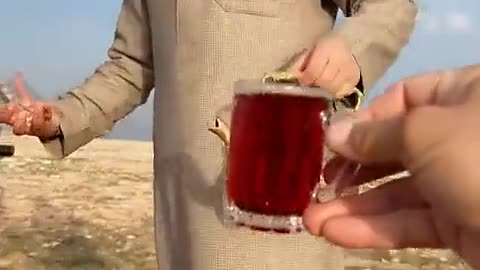 Father and sons enjoy tea