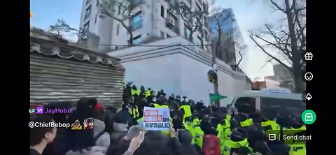 Tons of thousands of people are supporting the president of South Korea outside his house in Seoul