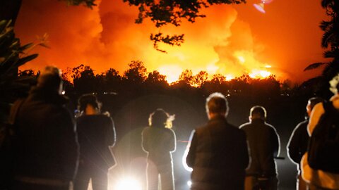 California wildfires latest: 50,000 flee as blaze spreads with “zero containment”