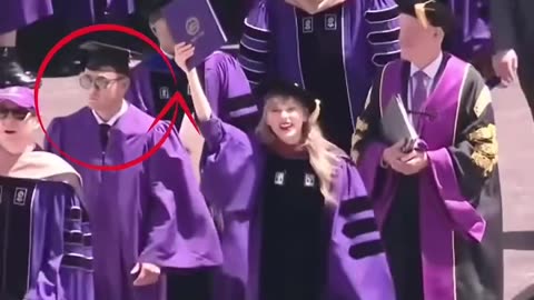 Taylor Swift at Graduation her Security fits in Well