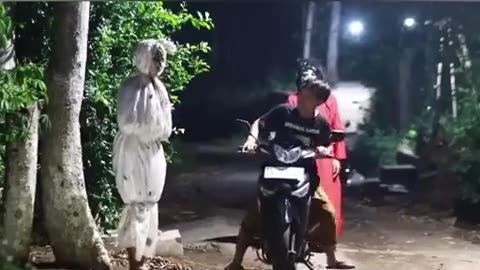 motorbike rider is confronted by a ghost in a quiet place